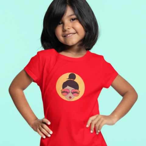 A child wearing a Kids Parishkaaree Logo Tee in vibrant red, showcasing the iconic logo and comfortable fit.