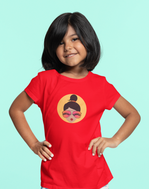 A child wearing a Kids Parishkaaree Logo Tee in vibrant red, showcasing the iconic logo and comfortable fit.