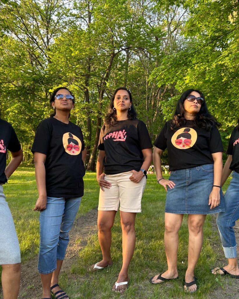 Happy customer wearing Parishkaaree T-shirt with Malayalam dialogue print.