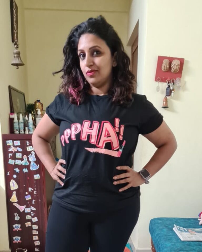 Happy customer wearing Parishkaaree T-shirt with Malayalam dialogue print.